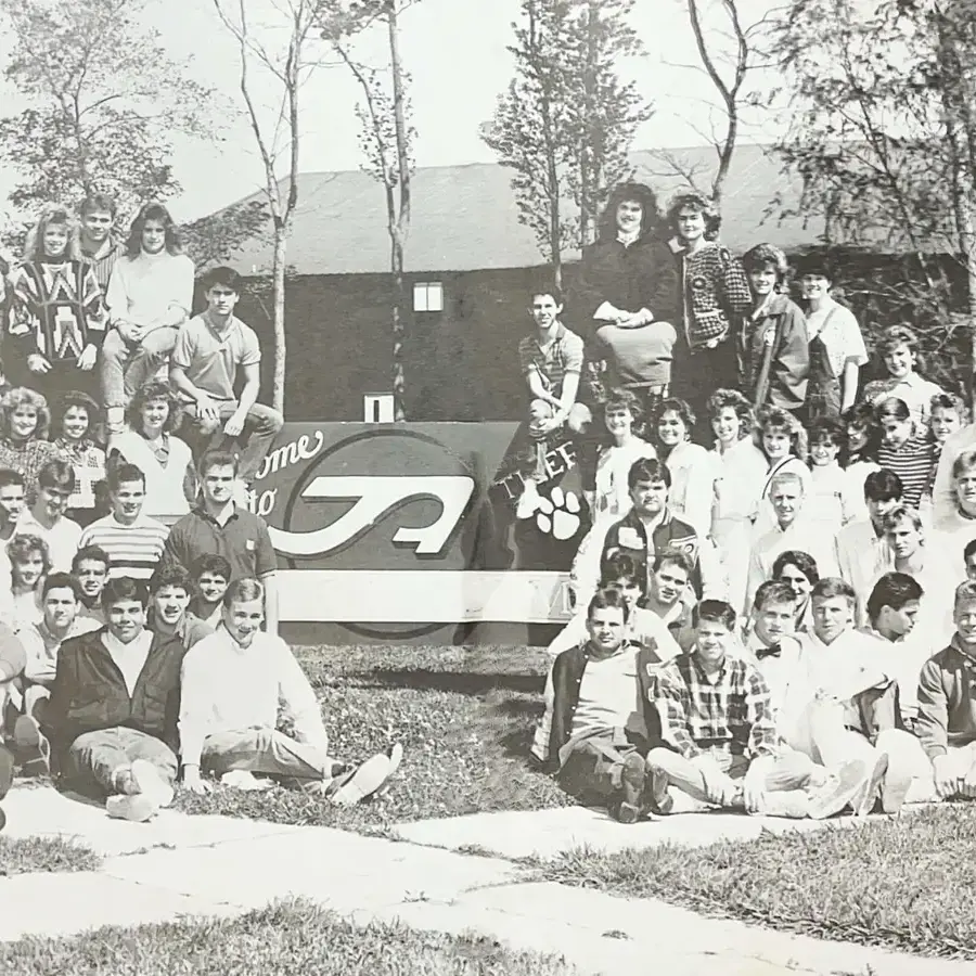 Students in front of the Trafton Academy sign