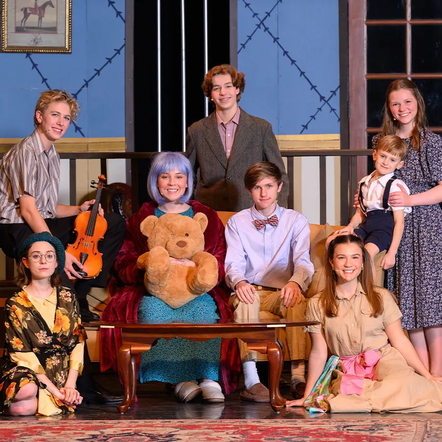 Group of upper school cast of play. 