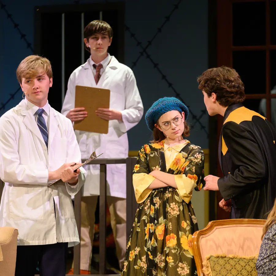 Four Dunham upper school performers acting in play.