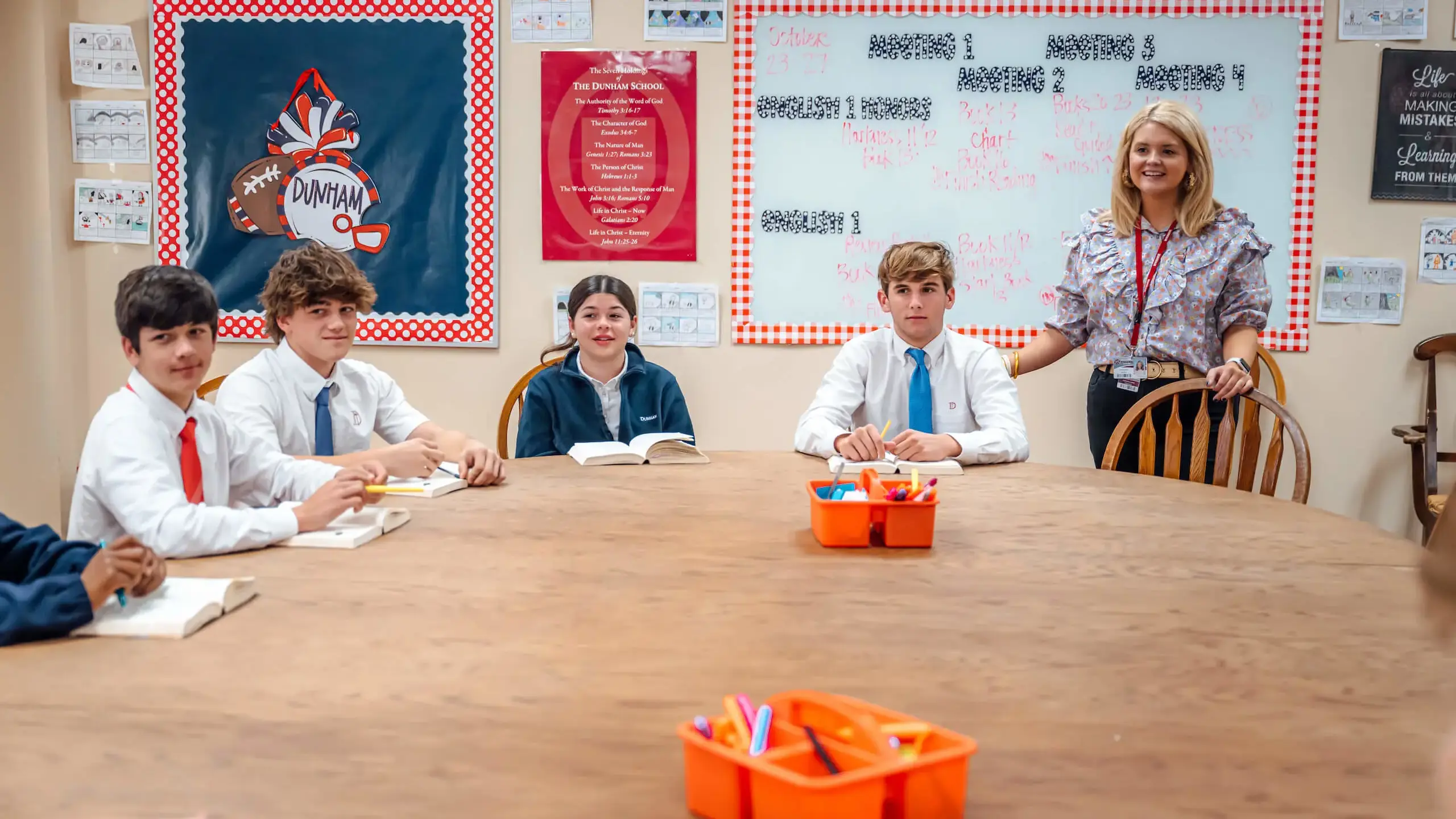 Dunham teacher and students at Harkness table