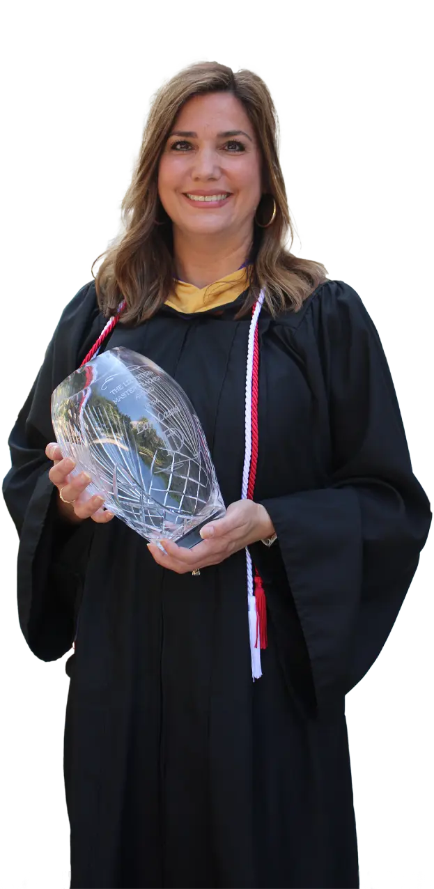 A member of the Dunham faculty with her master teacher award.