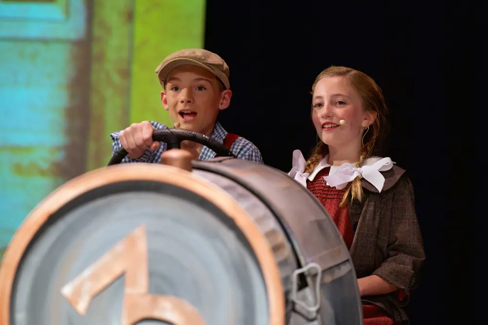 Two Middle School actors performing in Dunham musical. 