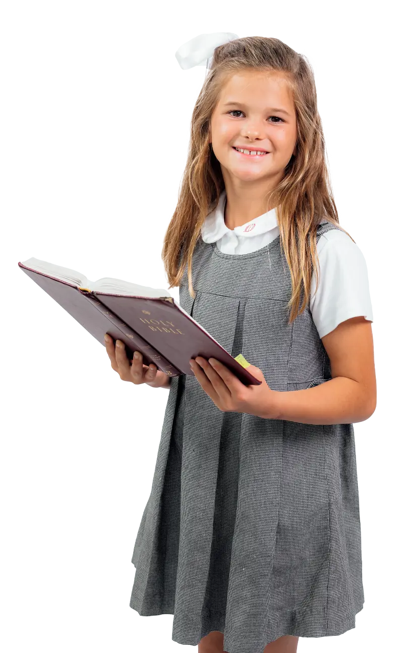 Dunham elementary school girl holding a book